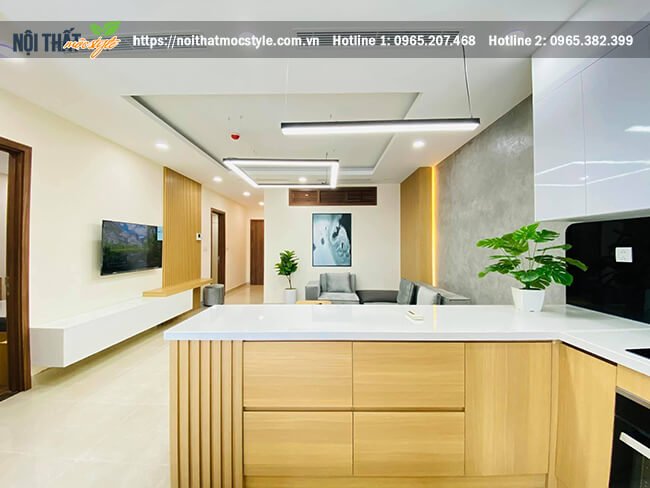 Bàn bar bếp bày trí liền thông với phòng khách tạo sự kết nối 2 không gian Bàn bar bếp bày trí liền thông với phòng khách tạo sự kết nối 2 không gian