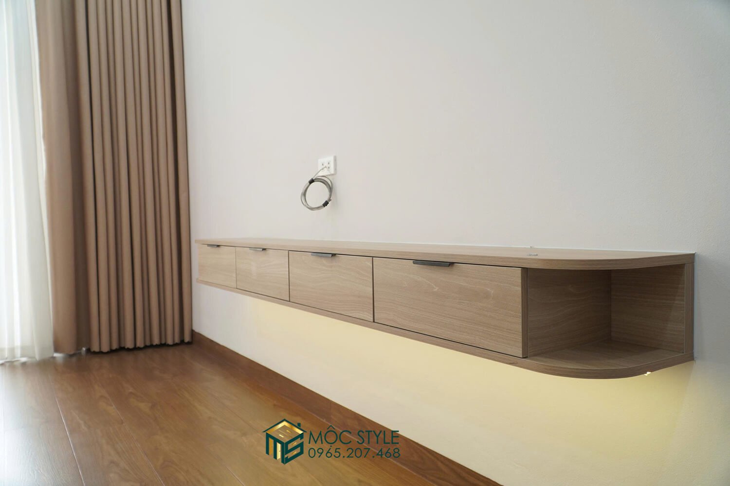 Kệ tivi treo tường bo cong tiện lợi